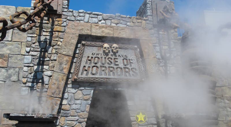 The entrance to the house of horrors with smoke and fog. Universal Studios in California. Hollywood. The entrance to the house of horrors with smoke and fog. Universal Studios in California. Hollywood