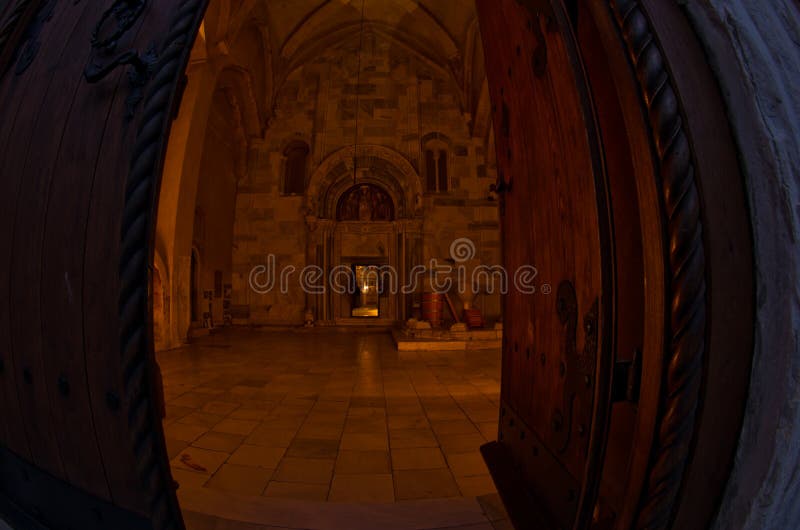 Entrance to church inside 12.century Studenica monastery at evening, UNESCO world heritage site in Serbia. Entrance to church inside 12.century Studenica monastery at evening, UNESCO world heritage site in Serbia