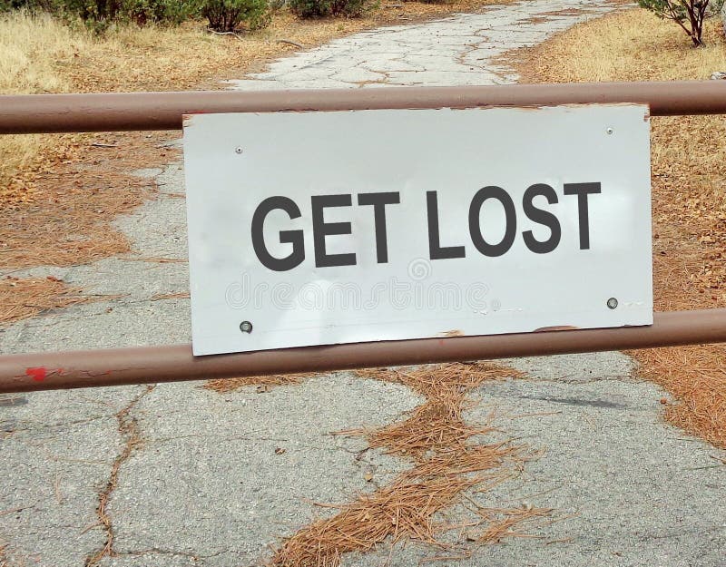 This is an image of a gate with a very unwelcoming sign that says `Get Lost`. The background is a rural road. The image could be used to represent barriers of all kinds, both real or imagined,social or political, closed off areas or opportunity, incivility or intolerance. It could represent people who have problems dealing with others, depression, social anxiety, antisocial behavior, or avoidant personality disorder. This is an image of a gate with a very unwelcoming sign that says `Get Lost`. The background is a rural road. The image could be used to represent barriers of all kinds, both real or imagined,social or political, closed off areas or opportunity, incivility or intolerance. It could represent people who have problems dealing with others, depression, social anxiety, antisocial behavior, or avoidant personality disorder.