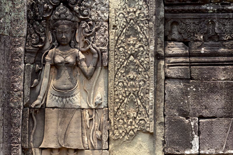 Высекаенный каменный барельеф виска Angkor Wat сложного, Siem Reap, Камбоджи Историческое место архитектуры кхмера стоковое изображение Высекаенный каменный барельеф виска Angkor Wat сложного, Siem Reap, Камбоджи Историческое место архитектуры кхмера стоковое изображение