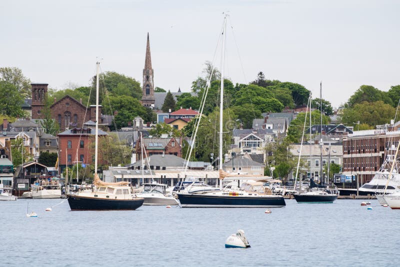 The harbor of Newport, Rhode Island, an international tourist and sailing destination in New England. The steeple is St. Mary`s Church, the location of the wedding for John F. Kennedy and Jacki. The harbor of Newport, Rhode Island, an international tourist and sailing destination in New England. The steeple is St. Mary`s Church, the location of the wedding for John F. Kennedy and Jacki.