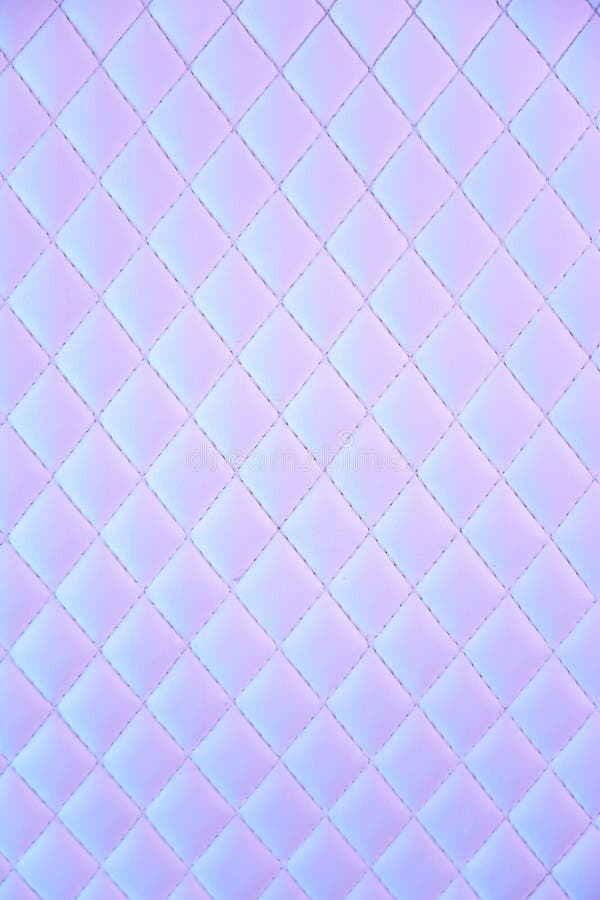 Wrinkled abstract 80s texture with multiple colorsGeometric diamond pattern quilted PU leather in neon light. gradient mosaic textured multi-colored background. Wrinkled abstract 80s texture with multiple colorsGeometric diamond pattern quilted PU leather in neon light. gradient mosaic textured multi-colored background