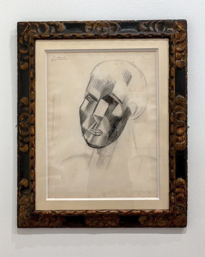 Pictured is Head of a Man by Pablo Picasso on display in The Morgan Library & Museum in New York City, New York. The black fabricated chalk drawing was executed in 1909 and signed by Picasso in the top left corner in black graphite. Pablo Picasso was born in 1881 and died in 1973. Pictured is Head of a Man by Pablo Picasso on display in The Morgan Library & Museum in New York City, New York. The black fabricated chalk drawing was executed in 1909 and signed by Picasso in the top left corner in black graphite. Pablo Picasso was born in 1881 and died in 1973.