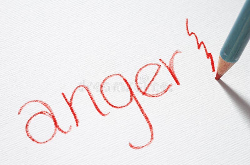 A red pencil hits a piece of paper with the word 'anger' written on it. A red pencil hits a piece of paper with the word 'anger' written on it.