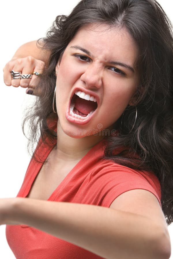 A young female expressing her anger to the camera. A young female expressing her anger to the camera.