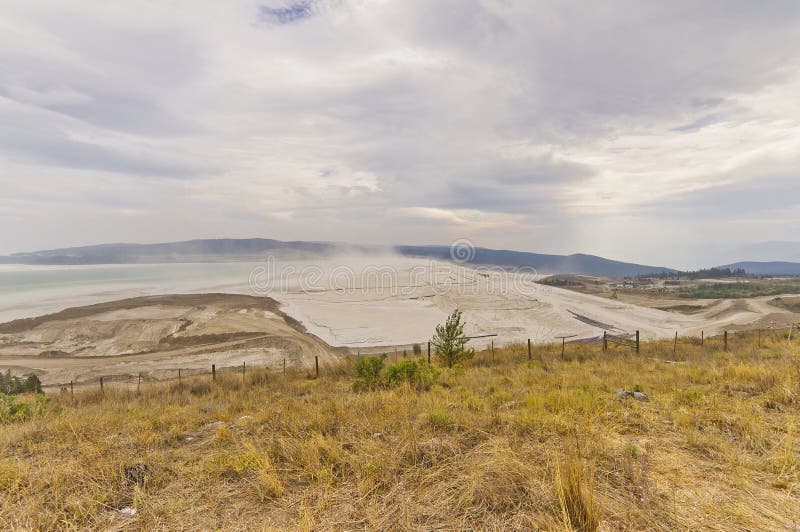 The massive tailings pond for the Highland Valley copper mine in BC, Canada. The massive tailings pond for the Highland Valley copper mine in BC, Canada.