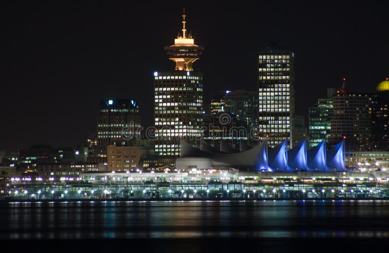 Night skyline of downtown vancouver with the sails of Canada Place illuminated. Night skyline of downtown vancouver with the sails of Canada Place illuminated