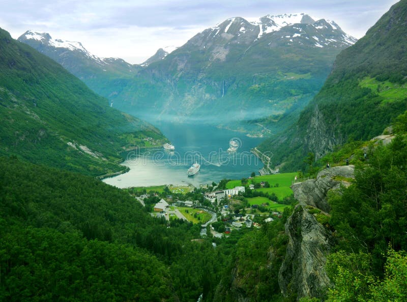 Forested mountains, valley and lake of Geiranger fjord in Norway. Forested mountains, valley and lake of Geiranger fjord in Norway.