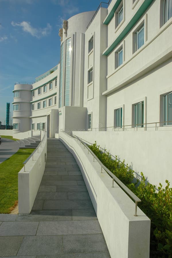 A fine example of Art Deco rebirth. The Midland Hotel in Morecambe, Lancashire It was built by the London, Midland and Scottish Railway (LMS), in 1933, to the designs of architect Oliver Hill, with sculpture by Eric Gill, and murals by Eric Ravilious (subsequently destroyed).[1][2] It is a Grade II* listed building. The hotel has been restored by Urban Splash with architects Union North, Northwest Regional Development Agency and A fine example of Art Deco rebirth. The Midland Hotel in Morecambe, Lancashire. A fine example of Art Deco rebirth. The Midland Hotel in Morecambe, Lancashire It was built by the London, Midland and Scottish Railway (LMS), in 1933, to the designs of architect Oliver Hill, with sculpture by Eric Gill, and murals by Eric Ravilious (subsequently destroyed).[1][2] It is a Grade II* listed building. The hotel has been restored by Urban Splash with architects Union North, Northwest Regional Development Agency and A fine example of Art Deco rebirth. The Midland Hotel in Morecambe, Lancashire