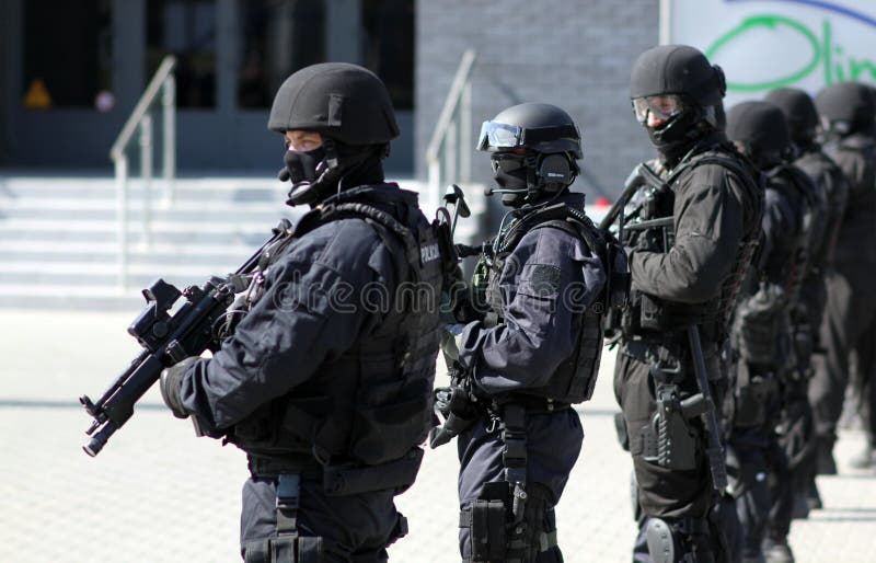 A ready group of anti-terrorists protects the object, armed anti-terrorists,. A ready group of anti-terrorists protects the object, armed anti-terrorists,