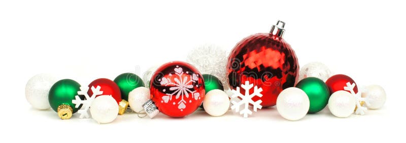 Christmas border of red, green and white ornaments over a white background. Christmas border of red, green and white ornaments over a white background