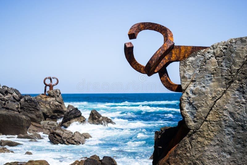 Combs of the Winds sculpture San Sebastian are iron sculptures on the Peine Del Viento. Created by Eduardo Chillida. Combs of the Winds sculpture San Sebastian are iron sculptures on the Peine Del Viento. Created by Eduardo Chillida.