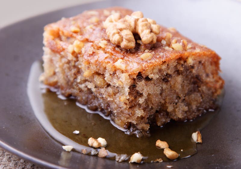 Close up of walnut cake with honey (or syrup ). Close up of walnut cake with honey (or syrup )