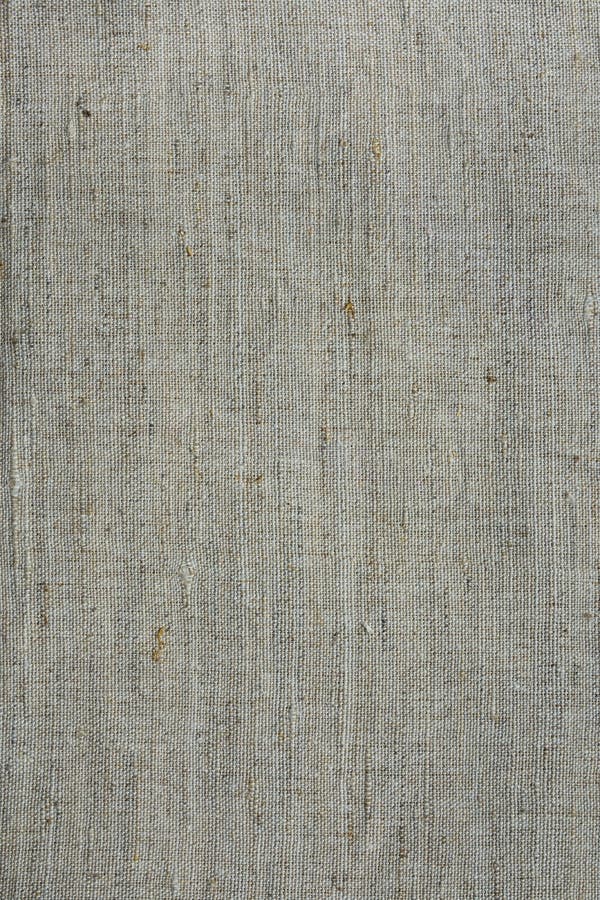 Rough linen canvas fabric texture, background, woven, wallpaper, light grey and beige tones, high resolution. Rough linen canvas fabric texture, background, woven, wallpaper, light grey and beige tones, high resolution