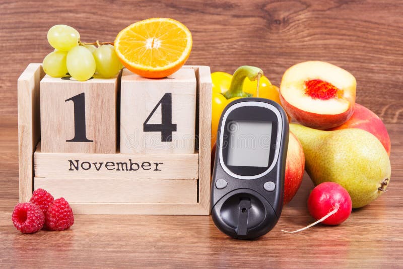 Дата 14-ое ноября как символ дня диабета мира, glucometer для измеряя уровня сахара и плодоовощи с овощами стоковые изображения Дата 14-ое ноября как символ дня диабета мира, glucometer для измеряя уровня сахара и плодоовощи с овощами стоковые изображения