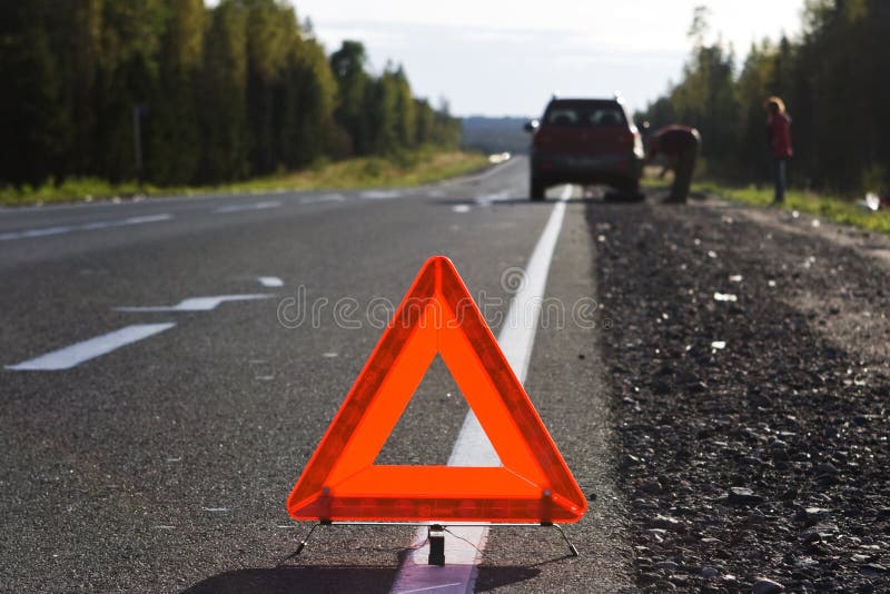 The traffic sign warning about road and transport incident, exposed on a highway roadside. The traffic sign warning about road and transport incident, exposed on a highway roadside