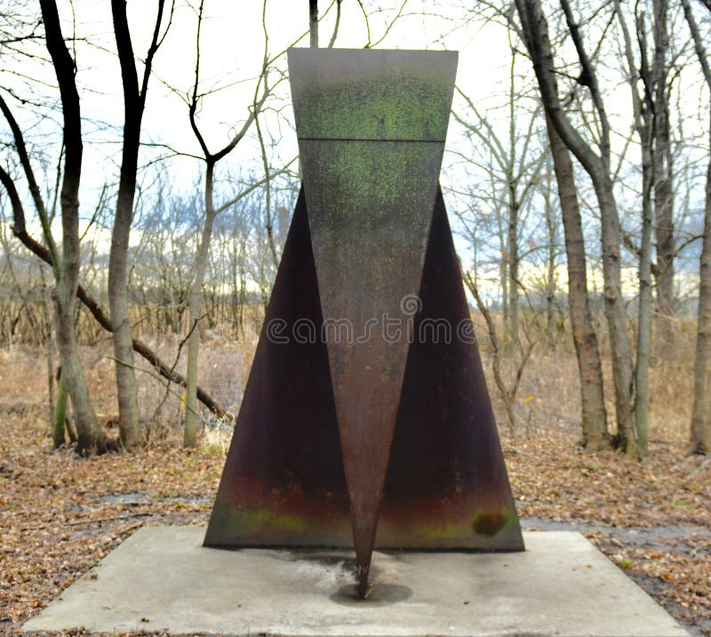 This is a Winter picture of a piece of public art titled: Fluke, on exhibit at Wendell Sculpture Garden at Meadowbrook Park located in Urbana, Illinois in Champaign County. This welded steel sculpture was created by Carl Billingsley in 1998. This picture was taken on January 4, 2019. This is a Winter picture of a piece of public art titled: Fluke, on exhibit at Wendell Sculpture Garden at Meadowbrook Park located in Urbana, Illinois in Champaign County. This welded steel sculpture was created by Carl Billingsley in 1998. This picture was taken on January 4, 2019.