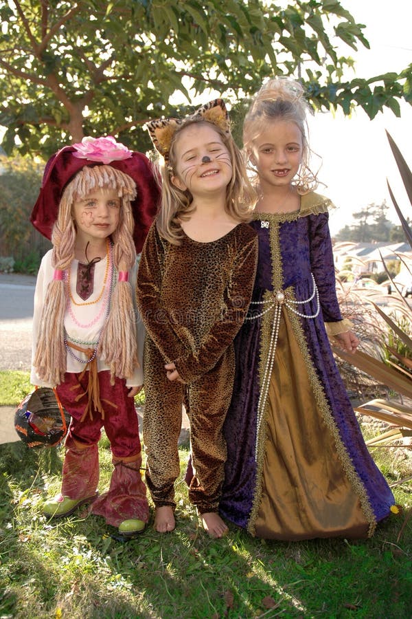 Children, aged 2. 5 and 6, in Halloween costumes. Children, aged 2. 5 and 6, in Halloween costumes