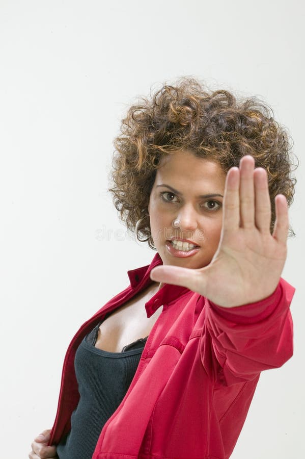 Picture of woman making stop sign to the camera. Picture of woman making stop sign to the camera