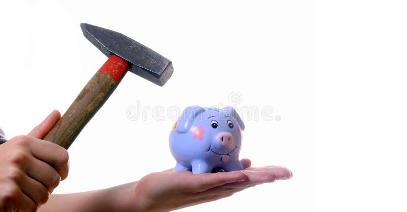 A young woman is breaking her piggybank with a hammer. Isolated over white with a lot of space for text!. A young woman is breaking her piggybank with a hammer. Isolated over white with a lot of space for text!