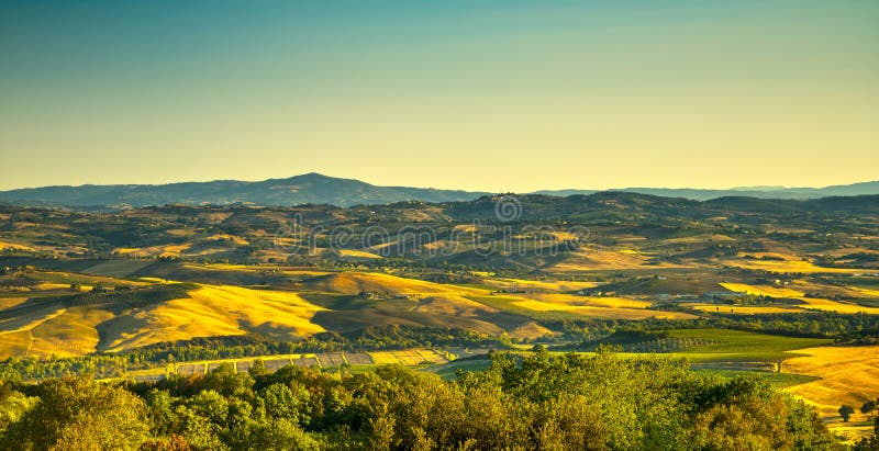 Tuscany countryside panoramic view from Montegiovi Amiata, vineyard and green fields. Grosseto Tuscany, Italy. Tuscany countryside panoramic view from Montegiovi Amiata, vineyard and green fields. Grosseto Tuscany, Italy