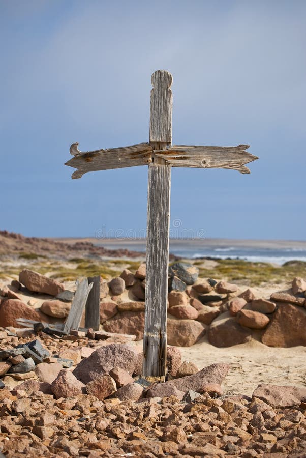 Old wooden cross by Cape Cross on the Skeleton Coast, Namibia. Old wooden cross by Cape Cross on the Skeleton Coast, Namibia.