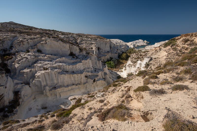 Деталь Греции острова Milos пляжа Sarakiniko в временени стоковое изображение Деталь Греции острова Milos пляжа Sarakiniko в временени стоковое изображение