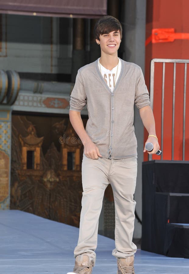 Singer Justin Bieber on Hollywood Boulevard for memorial celebration for Michael Jackson at Grauman's Chinese Theatre. Cirque du Soleil's new show Michael Jackson THE IMMORTAL World Tour premieres in Los Angeles tomorrow. January 26, 2012 Los Angeles, CA Picture: Paul Smith / Featureflash. Singer Justin Bieber on Hollywood Boulevard for memorial celebration for Michael Jackson at Grauman's Chinese Theatre. Cirque du Soleil's new show Michael Jackson THE IMMORTAL World Tour premieres in Los Angeles tomorrow. January 26, 2012 Los Angeles, CA Picture: Paul Smith / Featureflash