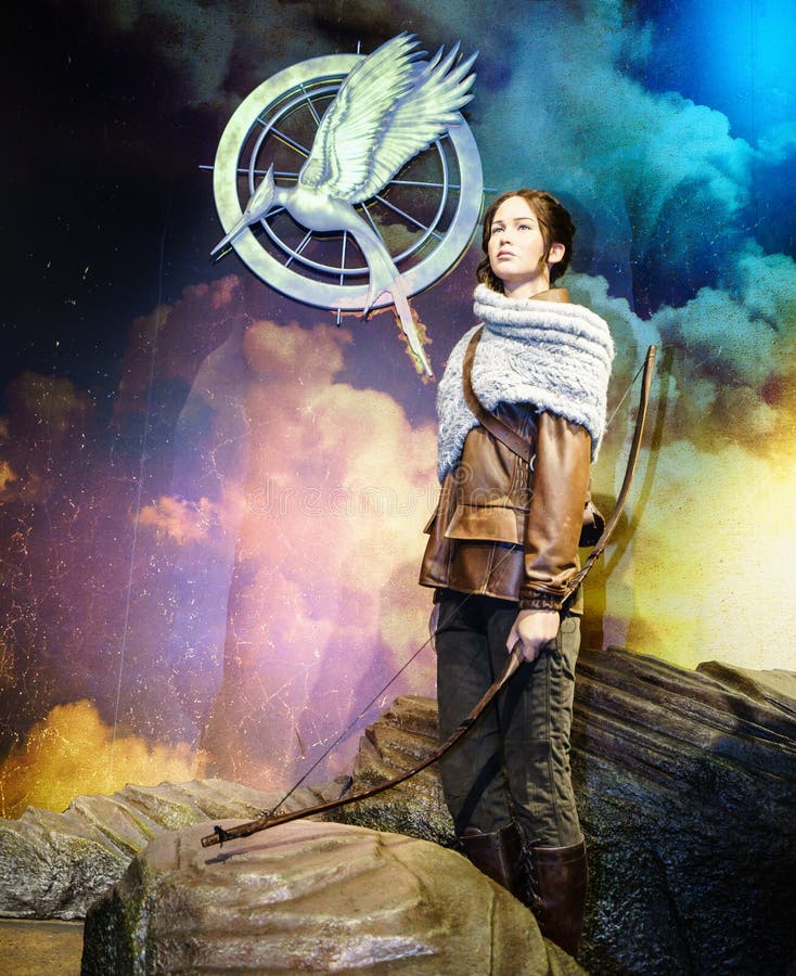 Jennifer Lawrences Hunger Games heroine, Katniss Everdeen. Jennifer Lawrence stars as ‘Katniss Everdeen’ in THE HUNGER GAMES: CATCHING FIRE waxwork at Londons Madame Tussauds, England. Photo taken on: Juillet 03rd, 2015. Jennifer Lawrences Hunger Games heroine, Katniss Everdeen. Jennifer Lawrence stars as ‘Katniss Everdeen’ in THE HUNGER GAMES: CATCHING FIRE waxwork at Londons Madame Tussauds, England. Photo taken on: Juillet 03rd, 2015.