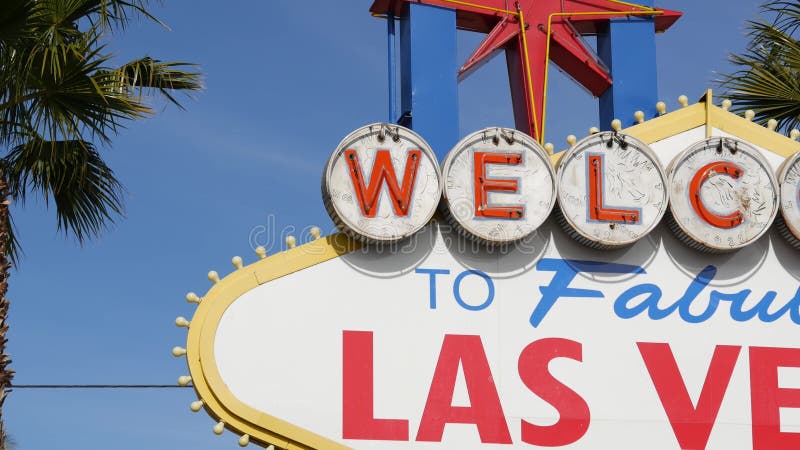 Welcome to fabulous Las Vegas retro neon sign in gambling tourist resort, USA. Iconic vintage banner as symbol of casino, games of chance, money playing and hazard betting. Lettering on signboard. Welcome to fabulous Las Vegas retro neon sign in gambling tourist resort, USA. Iconic vintage banner as symbol of casino, games of chance, money playing and hazard betting. Lettering on signboard