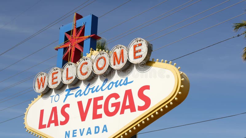 Welcome to fabulous Las Vegas retro neon sign in gambling tourist resort, USA. Iconic vintage banner as symbol of casino, games of chance, money playing and hazard betting. Lettering on signboard. Welcome to fabulous Las Vegas retro neon sign in gambling tourist resort, USA. Iconic vintage banner as symbol of casino, games of chance, money playing and hazard betting. Lettering on signboard