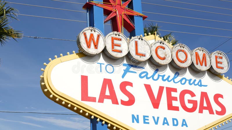 Welcome to fabulous Las Vegas retro neon sign in gambling tourist resort, USA. Iconic vintage banner as symbol of casino, games of chance, money playing and hazard betting. Lettering on signboard. Welcome to fabulous Las Vegas retro neon sign in gambling tourist resort, USA. Iconic vintage banner as symbol of casino, games of chance, money playing and hazard betting. Lettering on signboard