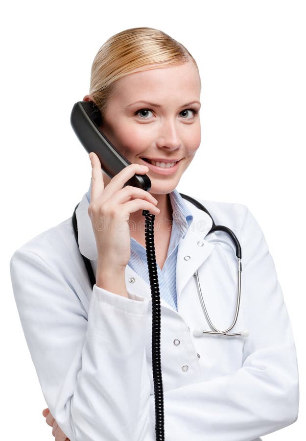 Doctor makes a phone call, isolated on white. Doctor makes a phone call, isolated on white