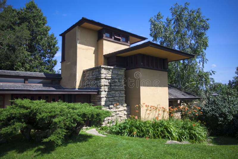 Spring Green, Wisconsin, USA - July 2, 2017: A view of the architecture of famous architect Frank Lloyd Wright`s home `Taliesin` built in 1911 in Spring Green, Wisconsin. Frank Lloyd Wright is considered to be one of the greatest American architects. Spring Green, Wisconsin, USA - July 2, 2017: A view of the architecture of famous architect Frank Lloyd Wright`s home `Taliesin` built in 1911 in Spring Green, Wisconsin. Frank Lloyd Wright is considered to be one of the greatest American architects.