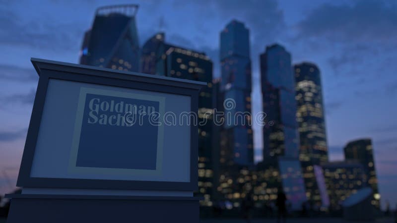 Доска с группой Goldman Sachs, Inc signage улицы логотип в вечере Запачканный небоскреб финансового района