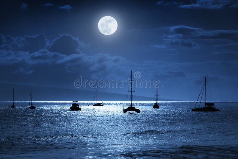This dramatic photo illustration of a nighttime sky over a calm ocean scene in Maui, Hawaii with brightly lit clouds, a large, full, Blue Moon, calm waves, and sparkling reflections would make a great background for many travel or vacation uses. This dramatic photo illustration of a nighttime sky over a calm ocean scene in Maui, Hawaii with brightly lit clouds, a large, full, Blue Moon, calm waves, and sparkling reflections would make a great background for many travel or vacation uses.