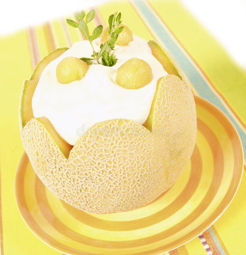Melon desert with cream filling in a melon. Melon desert with cream filling in a melon