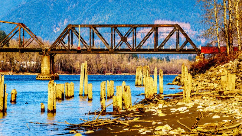 Railway Bridge over the Fraser River between the towns of Abbotsford and Mission in British Columbia, Canada. Railway Bridge over the Fraser River between the towns of Abbotsford and Mission in British Columbia, Canada