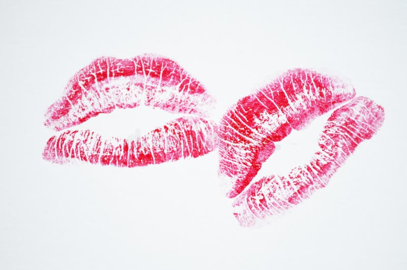 Lips with lipstick mark. Lipstick kiss on white background. Lips with lipstick mark. Lipstick kiss on white background.