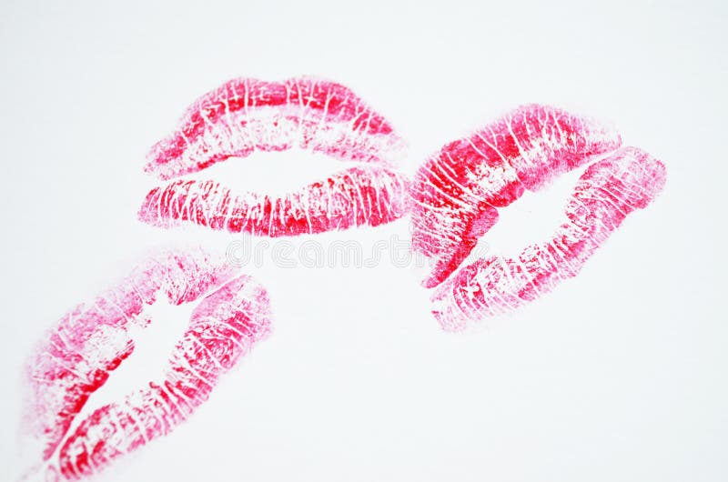Lips with lipstick mark. Lipstick kiss on white background. Lips with lipstick mark. Lipstick kiss on white background.