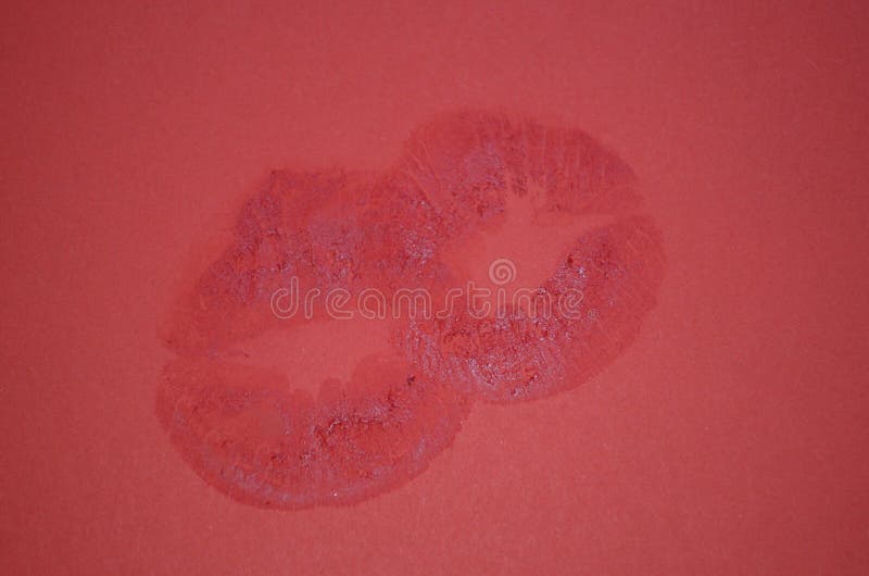 Lips with lipstick mark. Lipstick kiss on red background. Lips with lipstick mark. Lipstick kiss on red background.