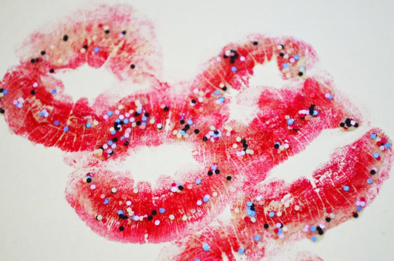 Lips with lipstick mark. Lipstick kiss on white background. Lips with lipstick mark. Lipstick kiss on white background.