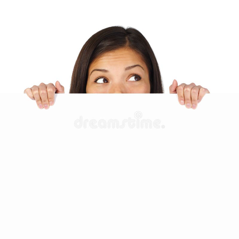 Excited woman holding and hiding behind blank sign looking up. Isolated on white. Excited woman holding and hiding behind blank sign looking up. Isolated on white.