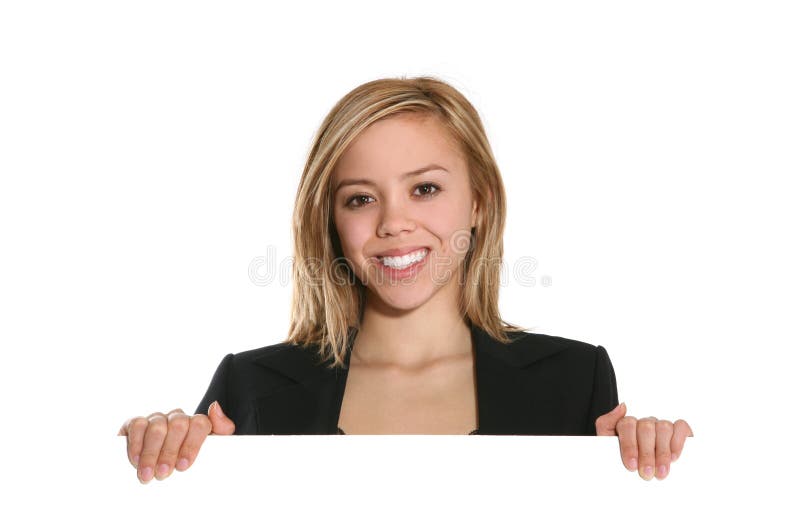 A pretty business woman holding a sign. A pretty business woman holding a sign