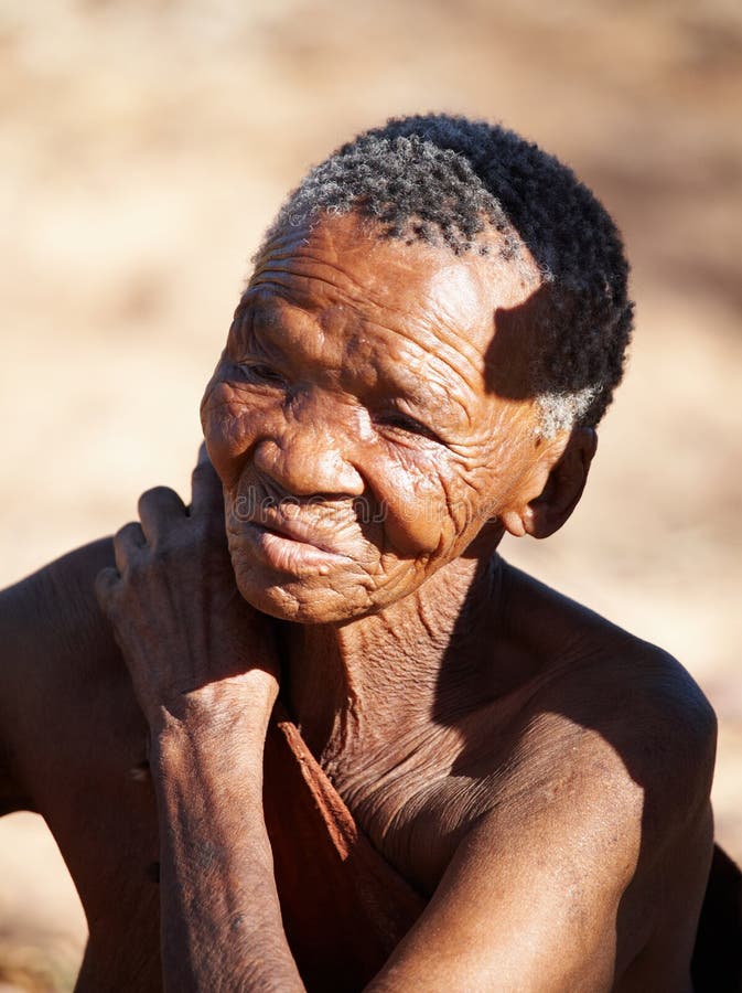 Bushman elderly woman, Namibia, Kalahari Desert. Bushmen are an indigenous people of southern Africa that living in Namibia, Botswana and some another countries. Bushman elderly woman, Namibia, Kalahari Desert. Bushmen are an indigenous people of southern Africa that living in Namibia, Botswana and some another countries
