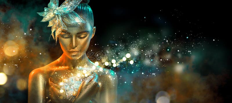Женщина фотомодели в красочных ярких золотых неоновых светах sparkles и представляя с фантазией цветет красивейший портрет девушк стоковые фото