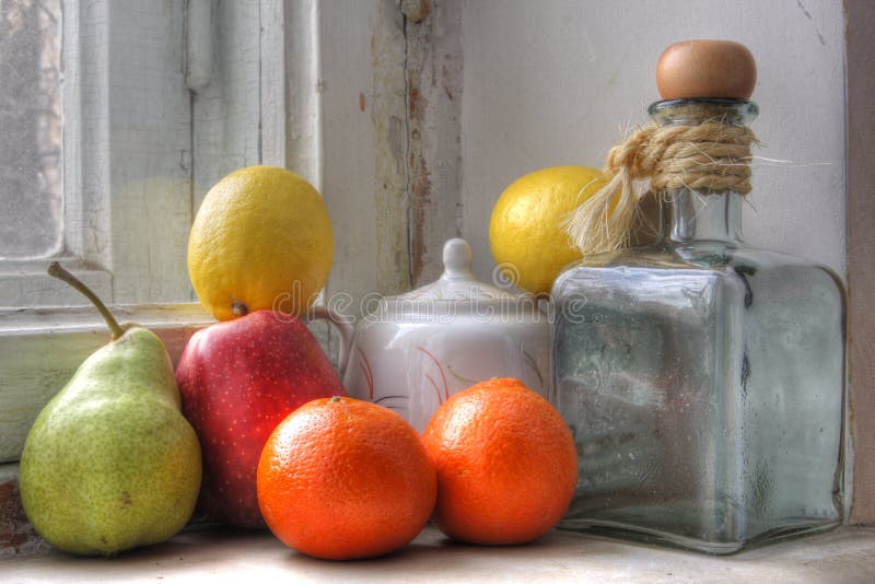 Old still life with apples, tangerines and vintage crockery. Old still life with apples, tangerines and vintage crockery