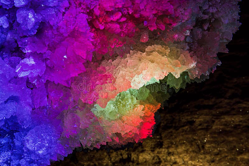 Illuminated and colorful rock crystal. Mlynky Cave, Ukraine. Illuminated and colorful rock crystal. Mlynky Cave, Ukraine