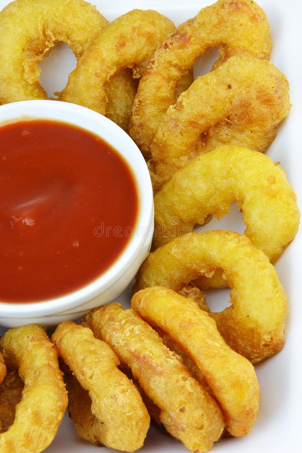 Зажаренный обвалянный в сухарях calamari стоковое фото Зажаренный обвалянный в сухарях calamari стоковое фото