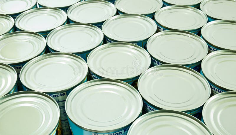 Stocking Up - A row of shiny canned food. Stocking Up - A row of shiny canned food.